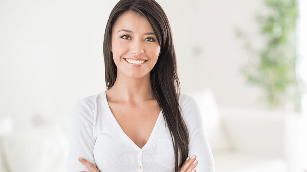 Woman with dark hair smiling