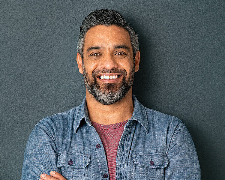 Mature man in blue shirt